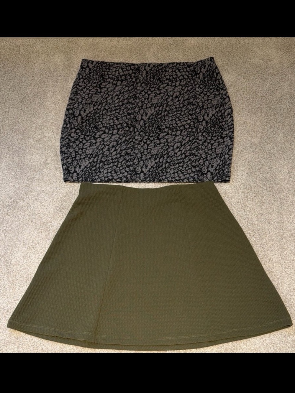 NWOT Pair women’s stretch mini skirts size large